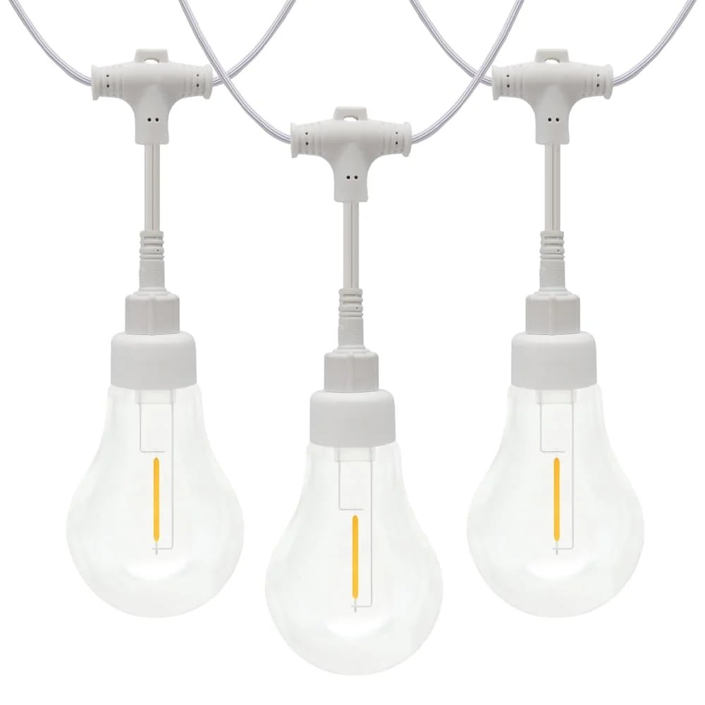 Modular commercial A19 LED string lights with waterproof twist-on connectors on white wire