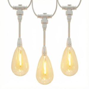 Close-up of white commercial grade string lights featuring warm S14 LED filament bulbs