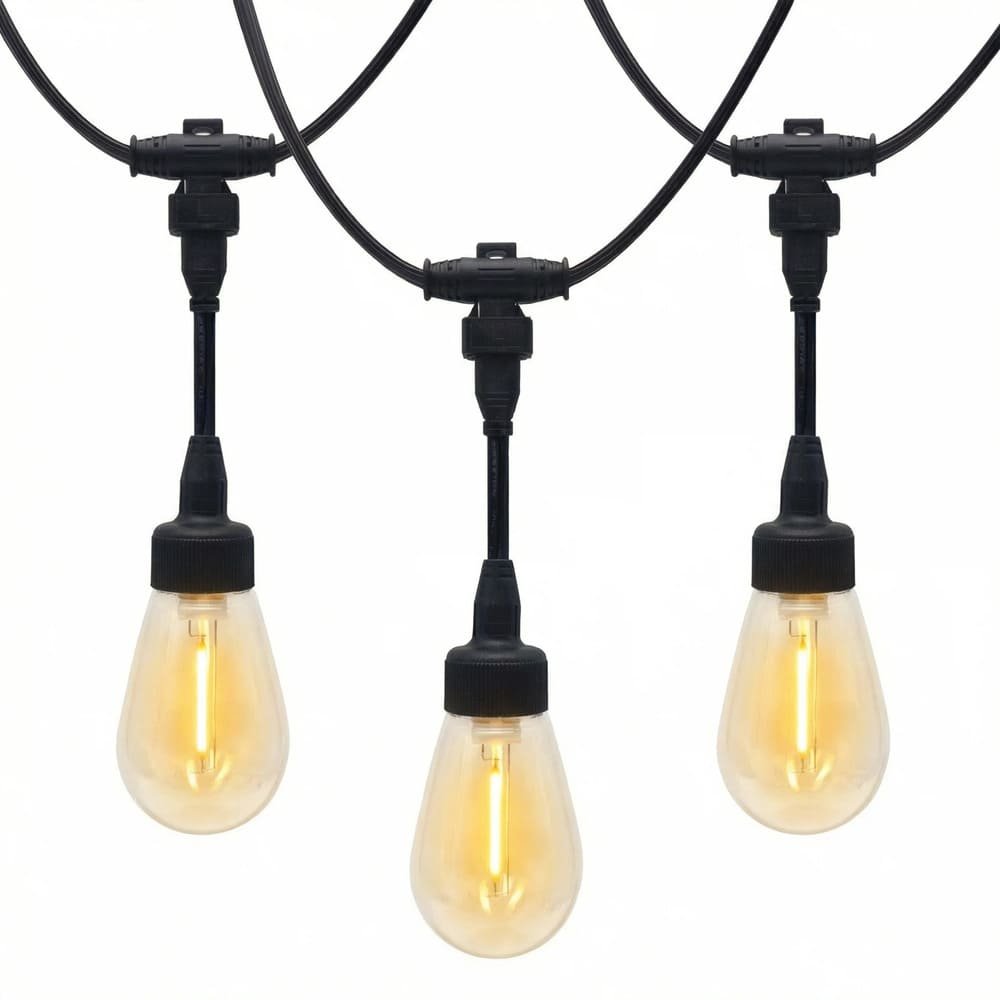 Illuminated commercial string lights featuring warm white S14 LED filament bulbs and waterproof drops