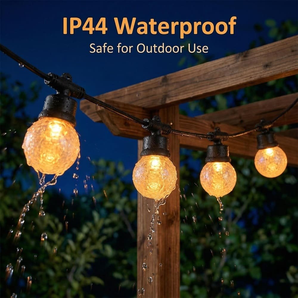 Heavy-duty commercial string lights enduring water splash test on outdoor pergola